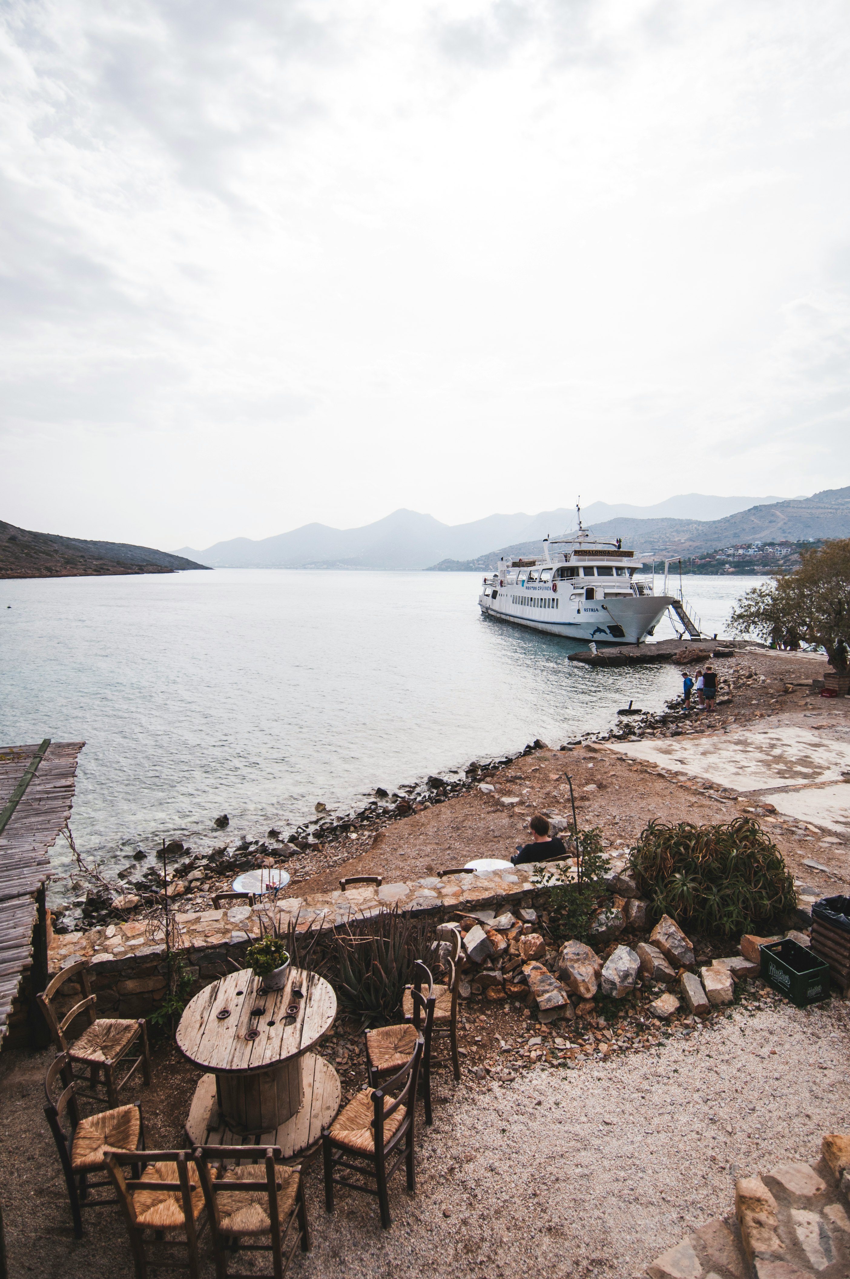 white boat on body of water during daytime